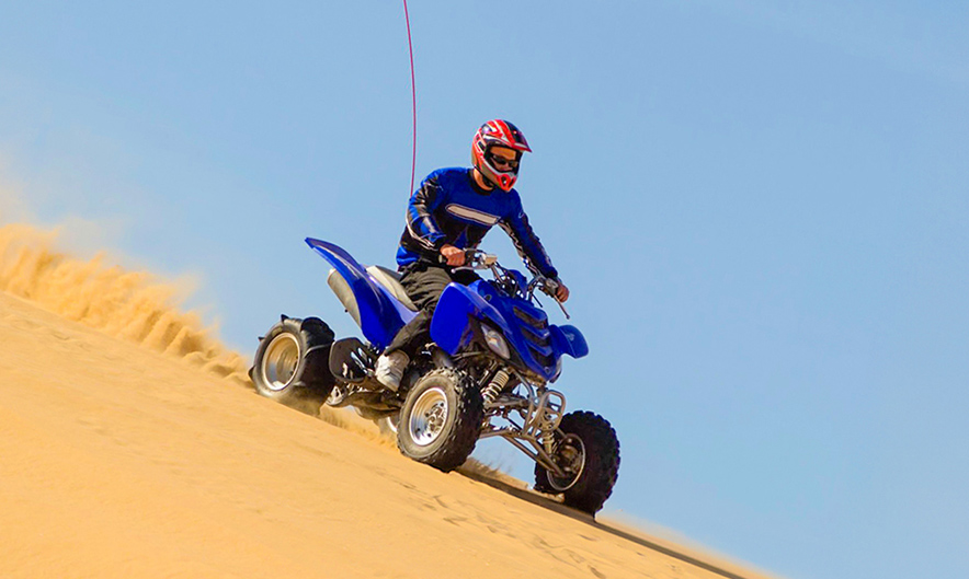 Yamaha Grizzly 450 CC quad bike in Dubai desert